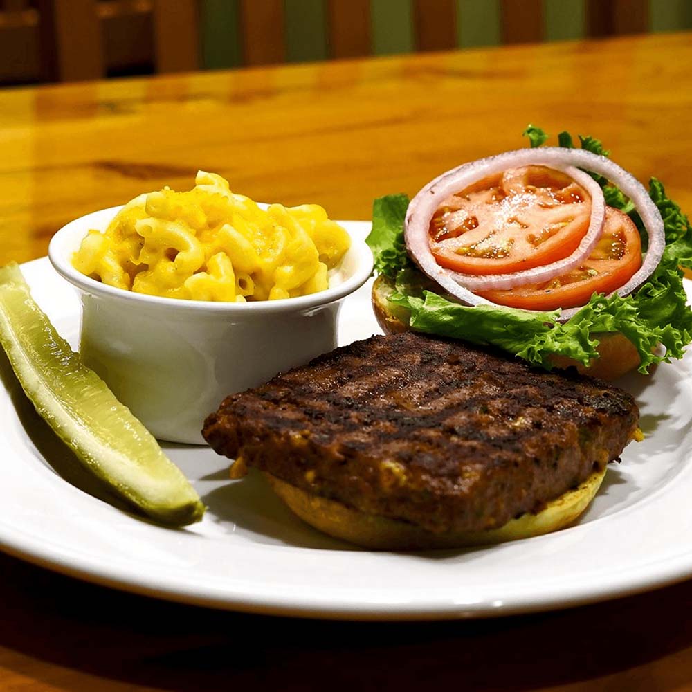 a chop of steak with salad